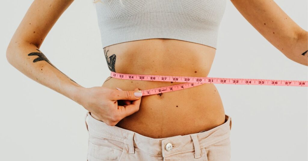Jelly Roll Weight Loss showing stubborn lower belly fat before fat loss
